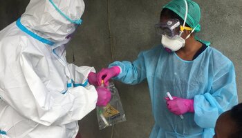 doctors testing biohazard sample